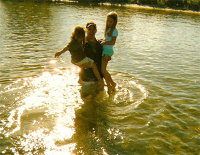 Skylar and her dad in the St. Lawrence river with her cousin Lexi